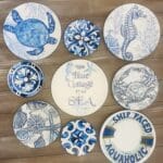 Decoupaged wall plates with summer design and theme