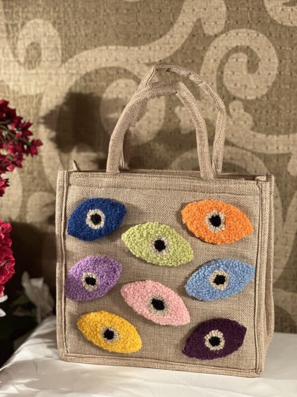 Colourful evil eye jute bag