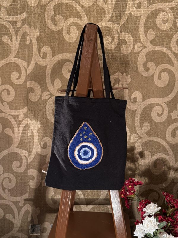 Evil eye tear shaped tote bag