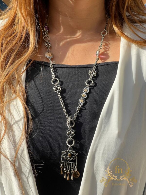 لقد جمعنا الحب فمن يفرقنا Silver necklace with dangling eye pendant gold plated